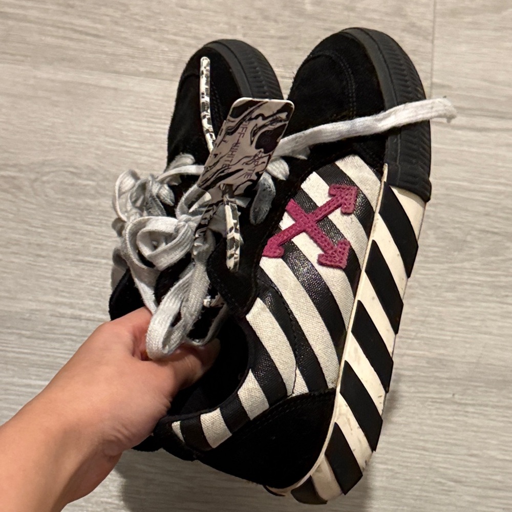 Off-White Zebra Striped Sneakers with Pink Accent